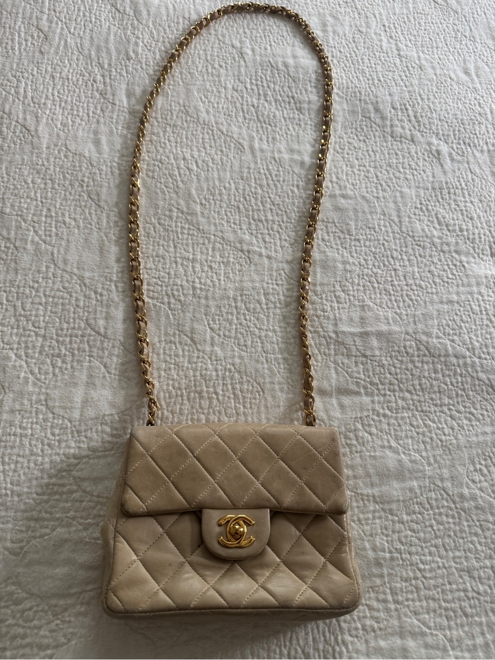 CHANEL Beige Quilted Mini Flap Crossbody with Gold Hardware